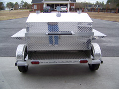 Barbecue trailer grill with cool touch handle and hood latch
